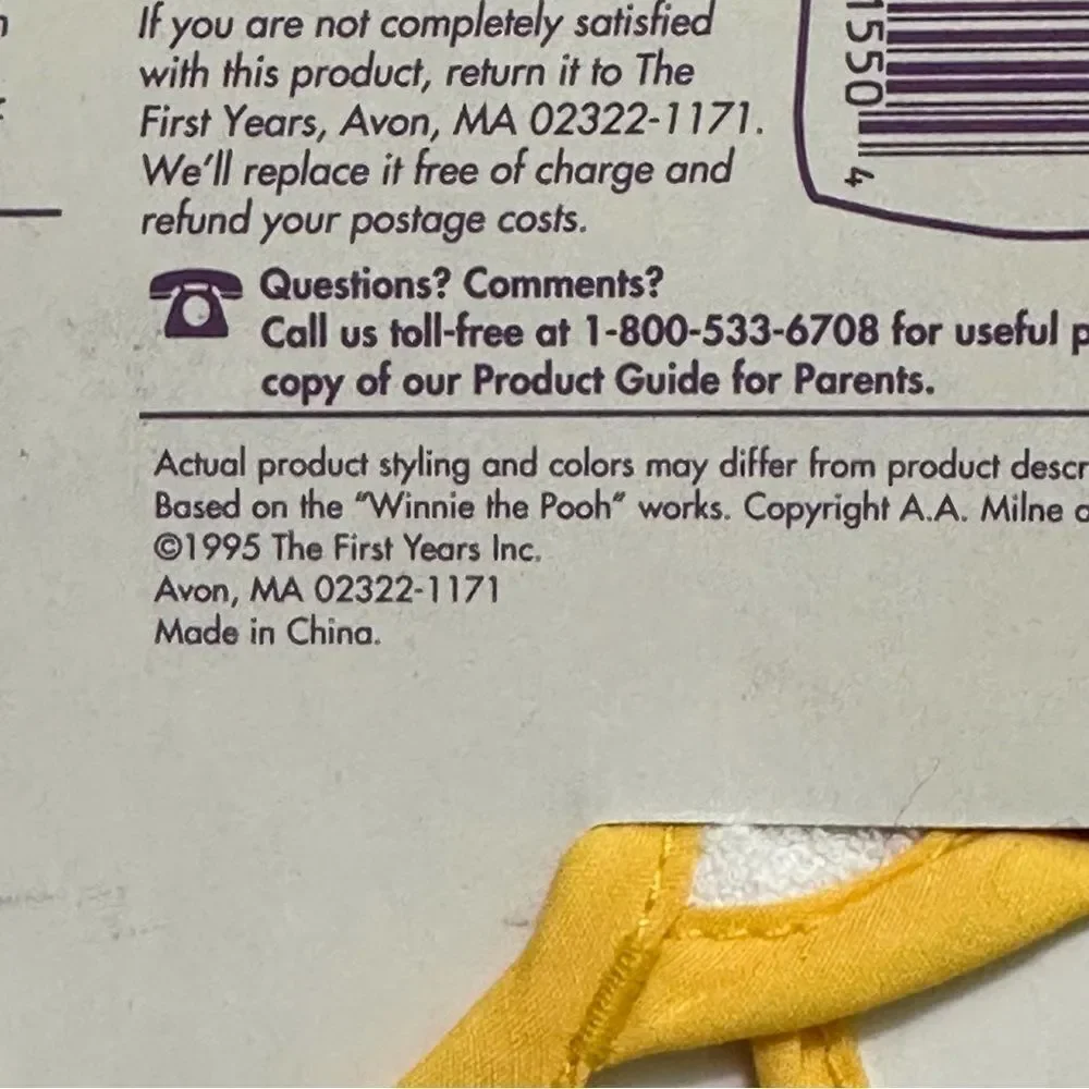 The first years Pooh Tie Bib Newborn